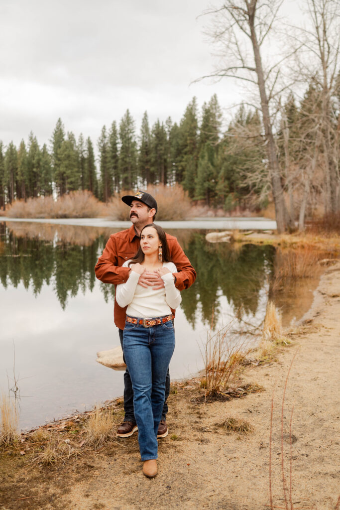 Engagement photos by a lake in Washoe Valley, Nevada.